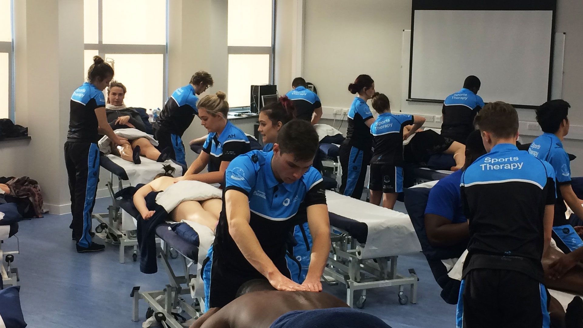 Sports Therapy students practicing massage at lab