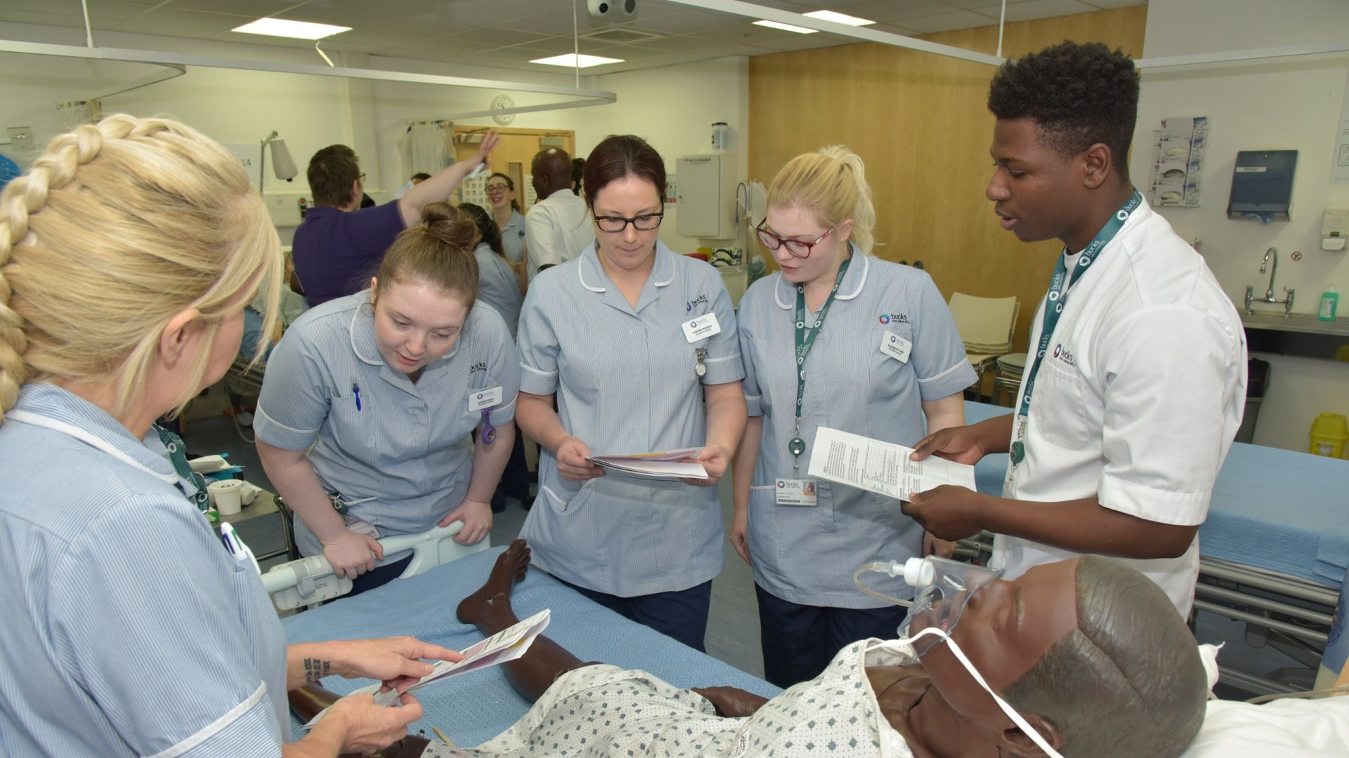 Group of Nursing students with mannequin 
