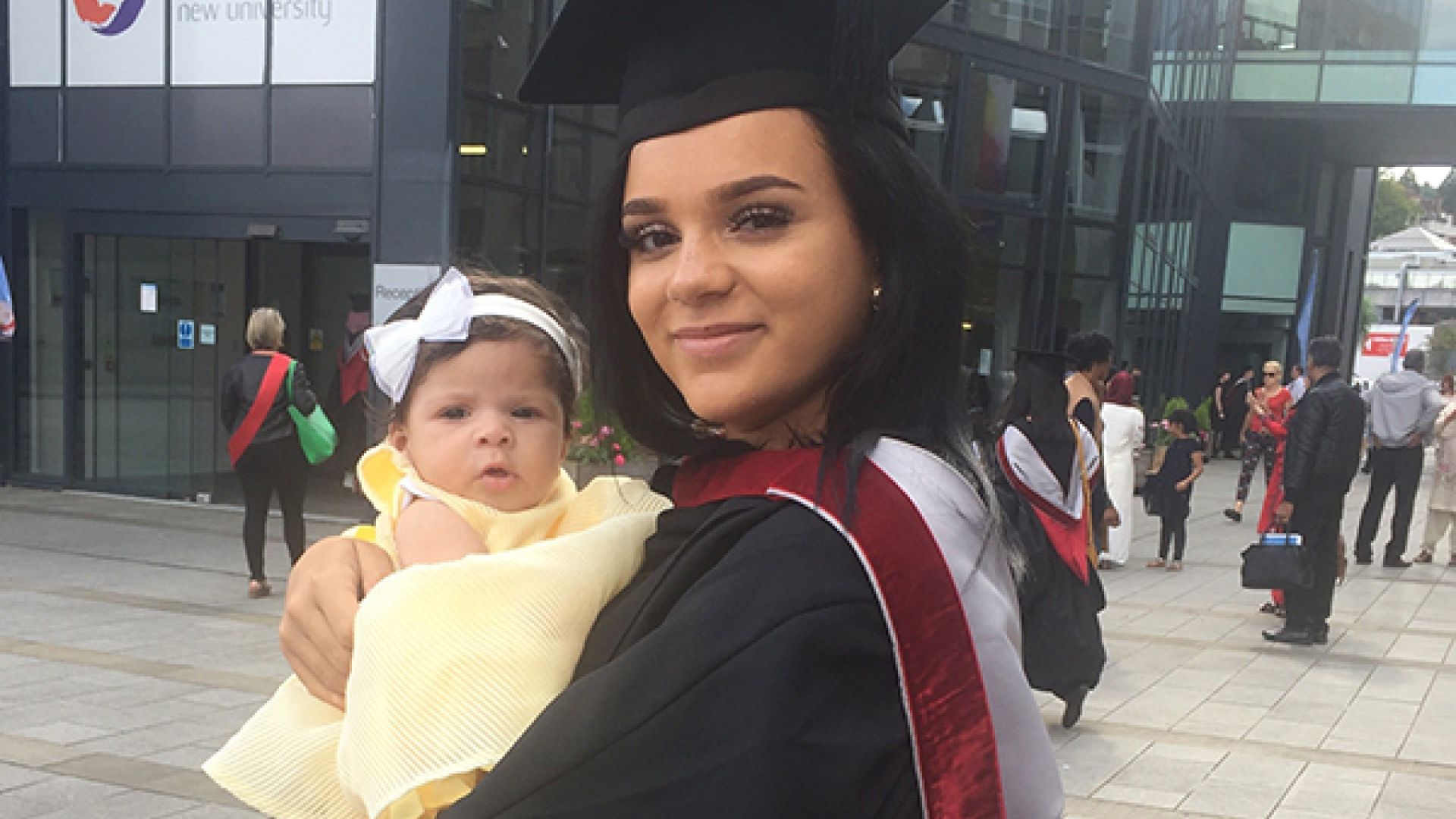 Sinead Morris outside High Wycombe campus with her baby