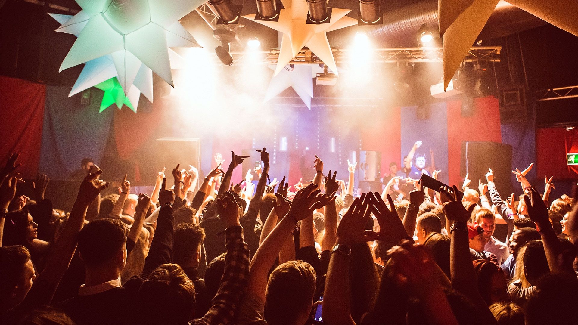 A nightclub full of students having fun