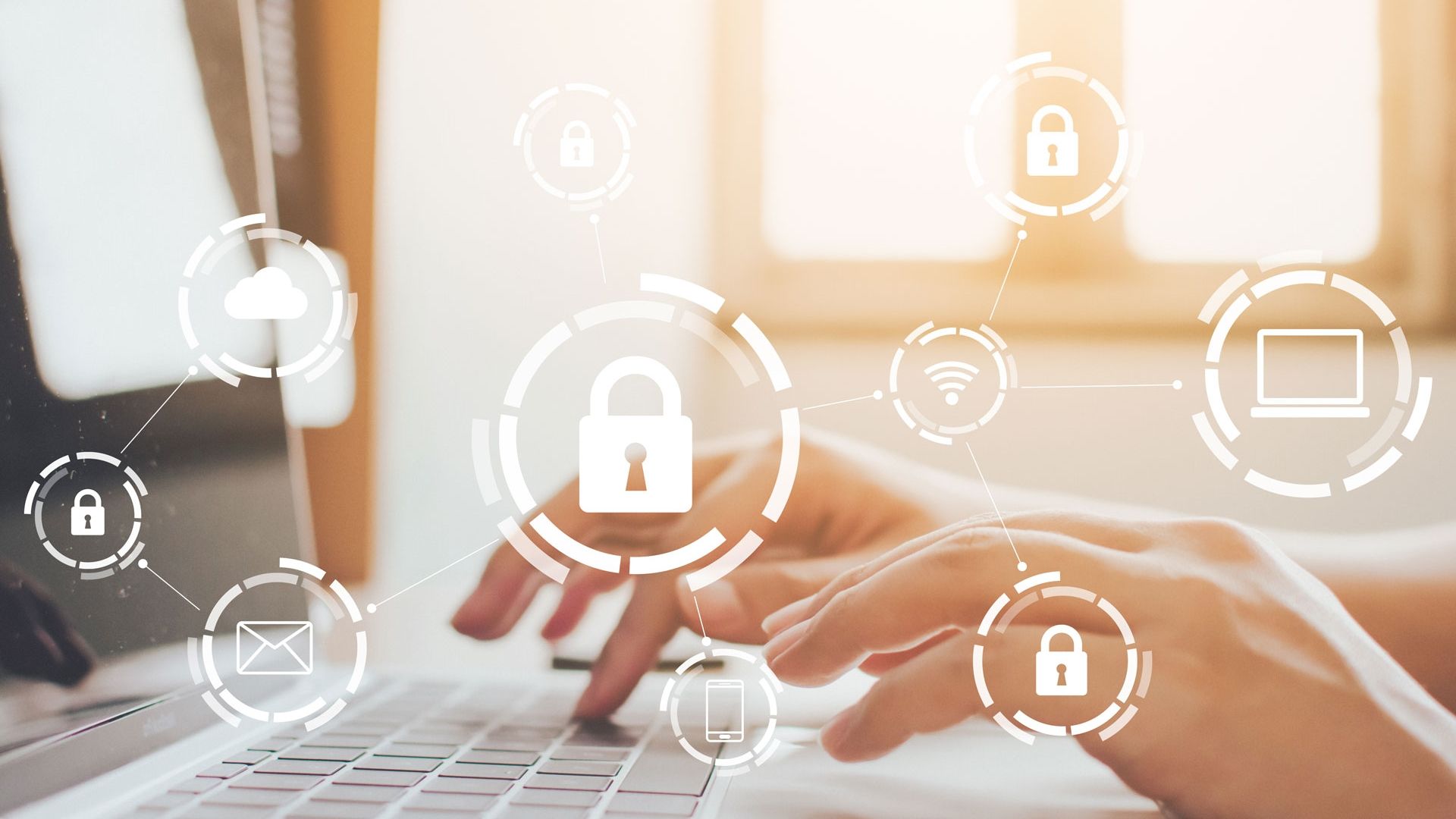 Cyber security person on laptop with lock symbol 