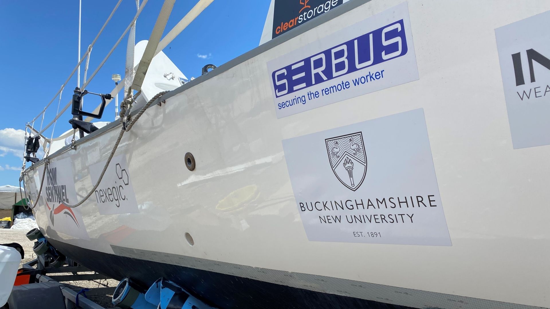 Ian Rivers' boat with Buckinghamshire New University branding