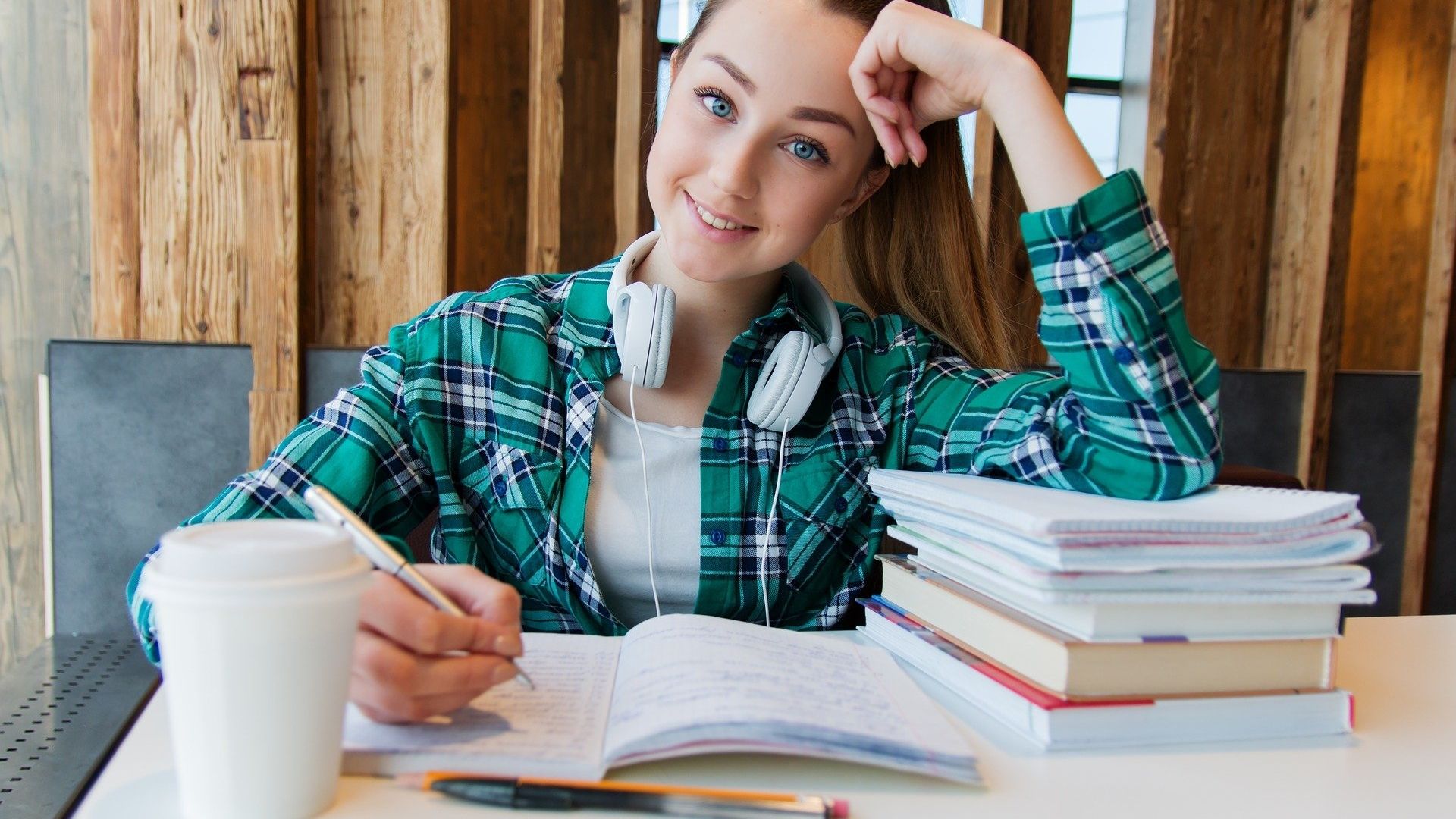 female student writing