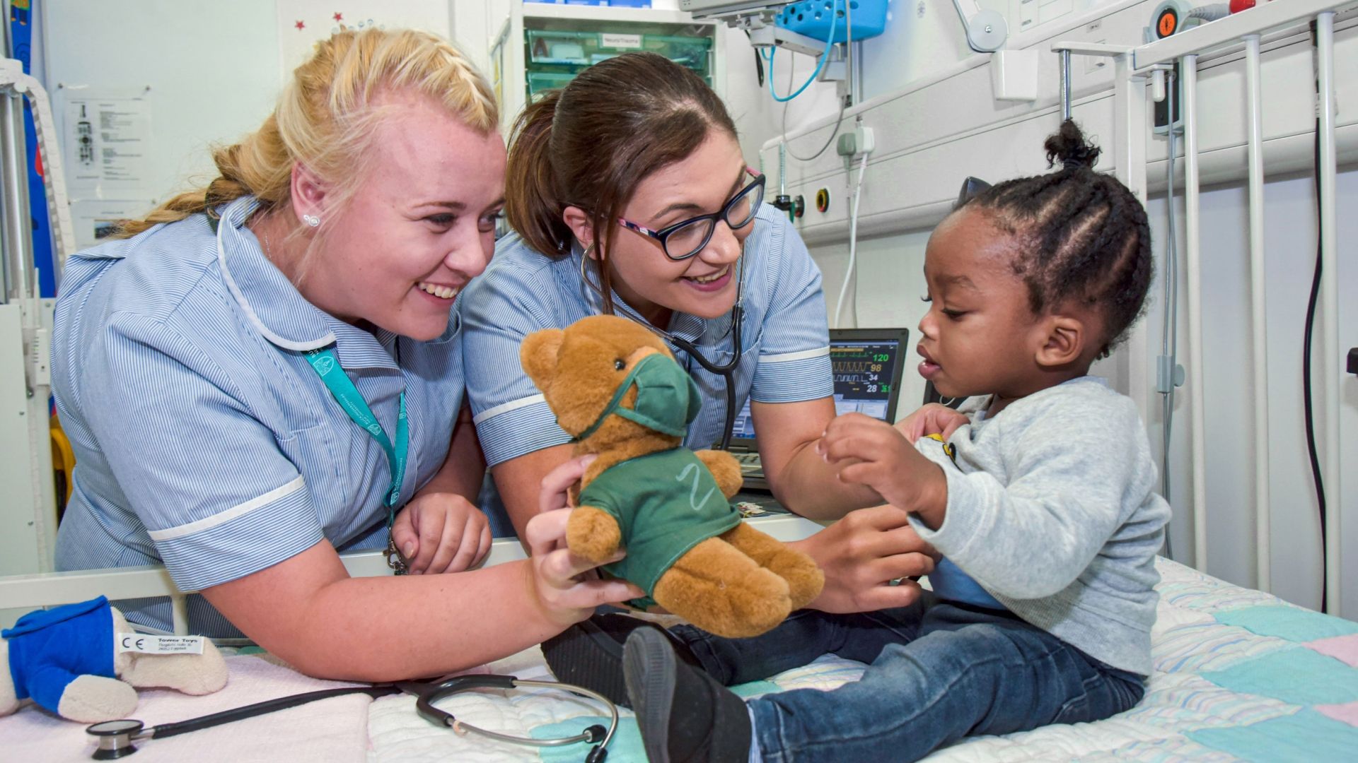 Children nurses with baby