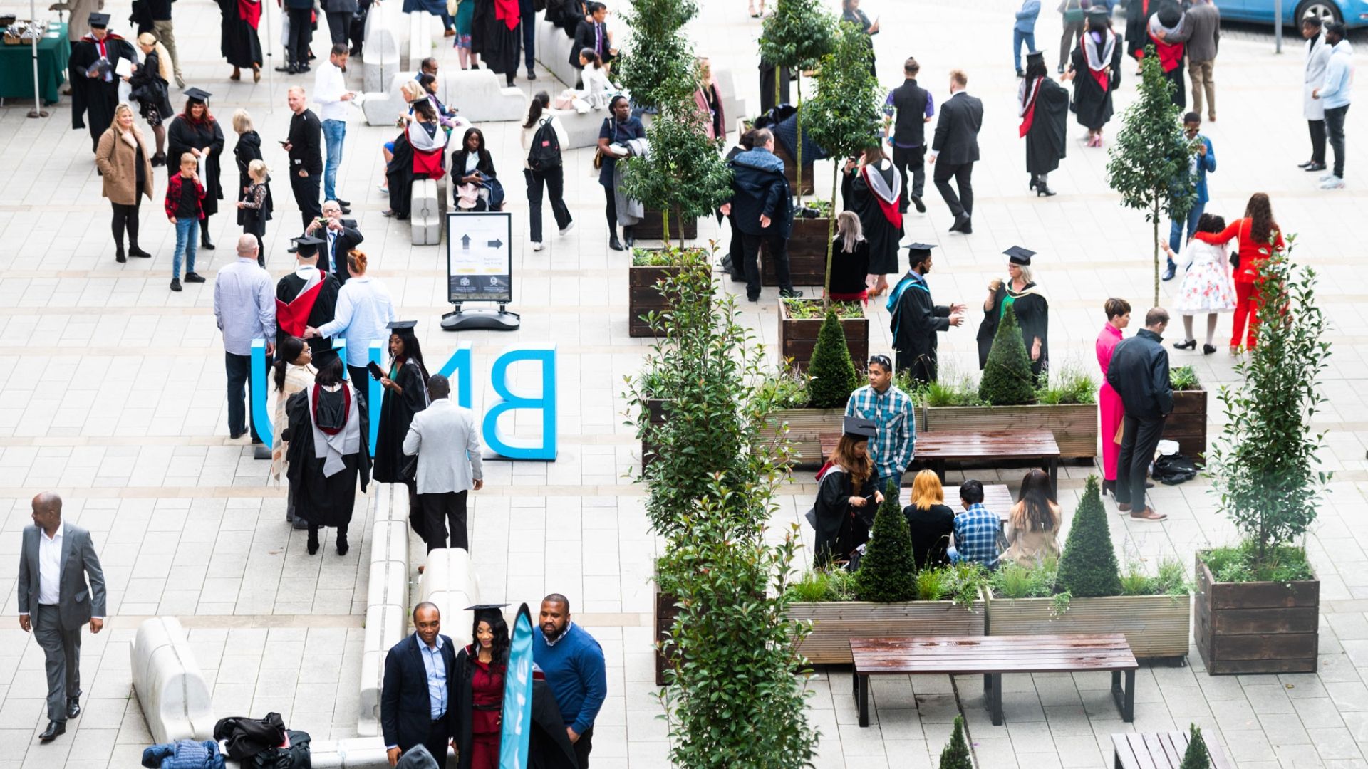 Graduands and their families at BNU concourse from above