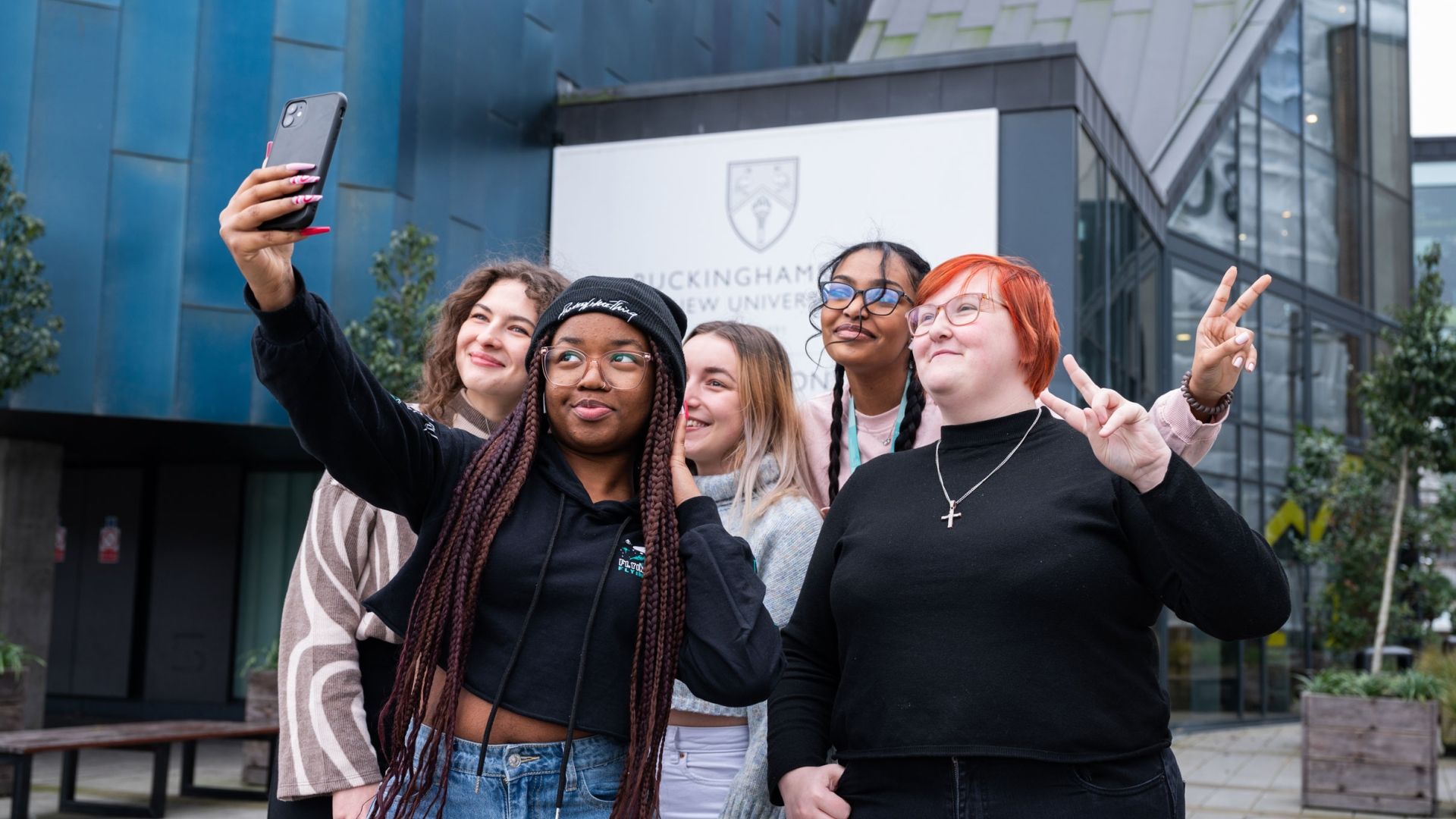 Group of student ambassadors outside Gateway building
