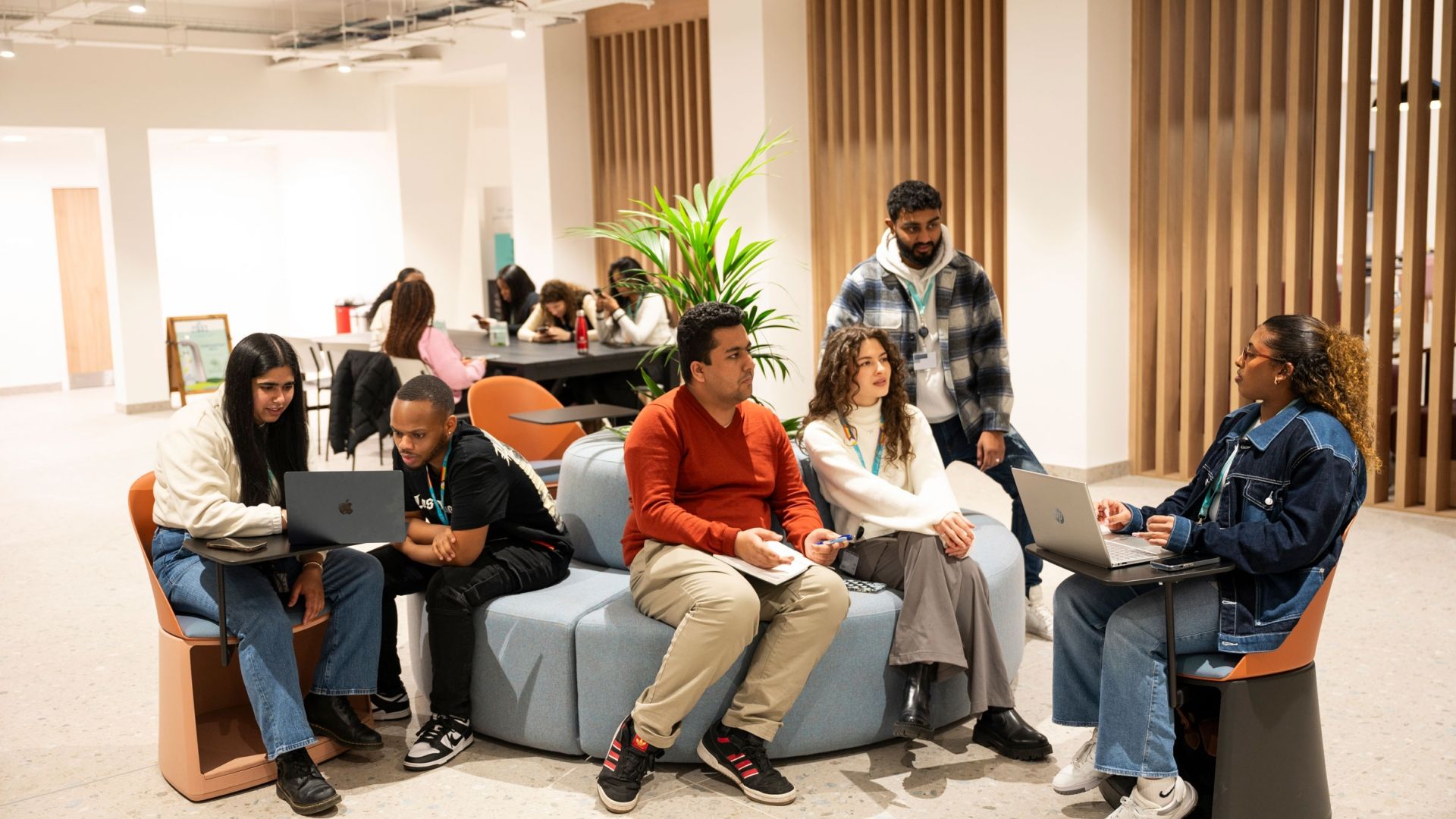 Group of students hanging out in the Atrium