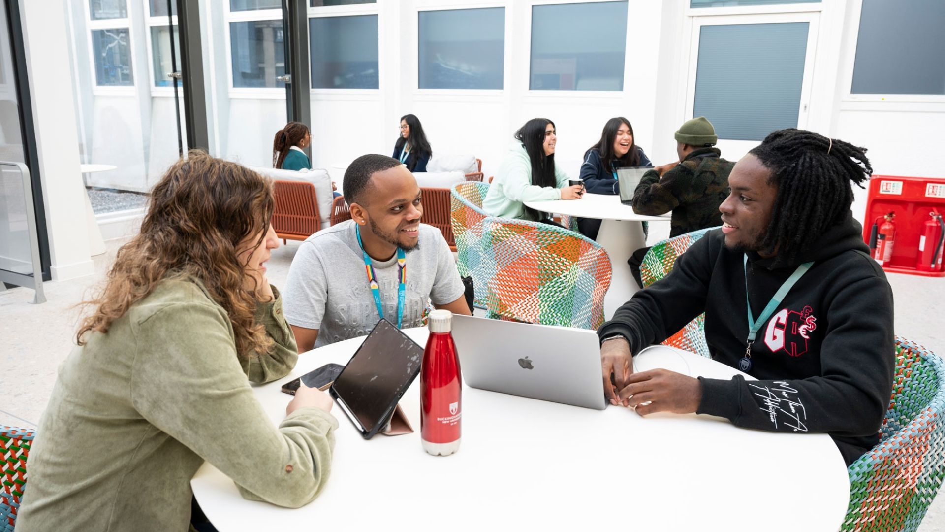 Group of students sat together in Winter Garden