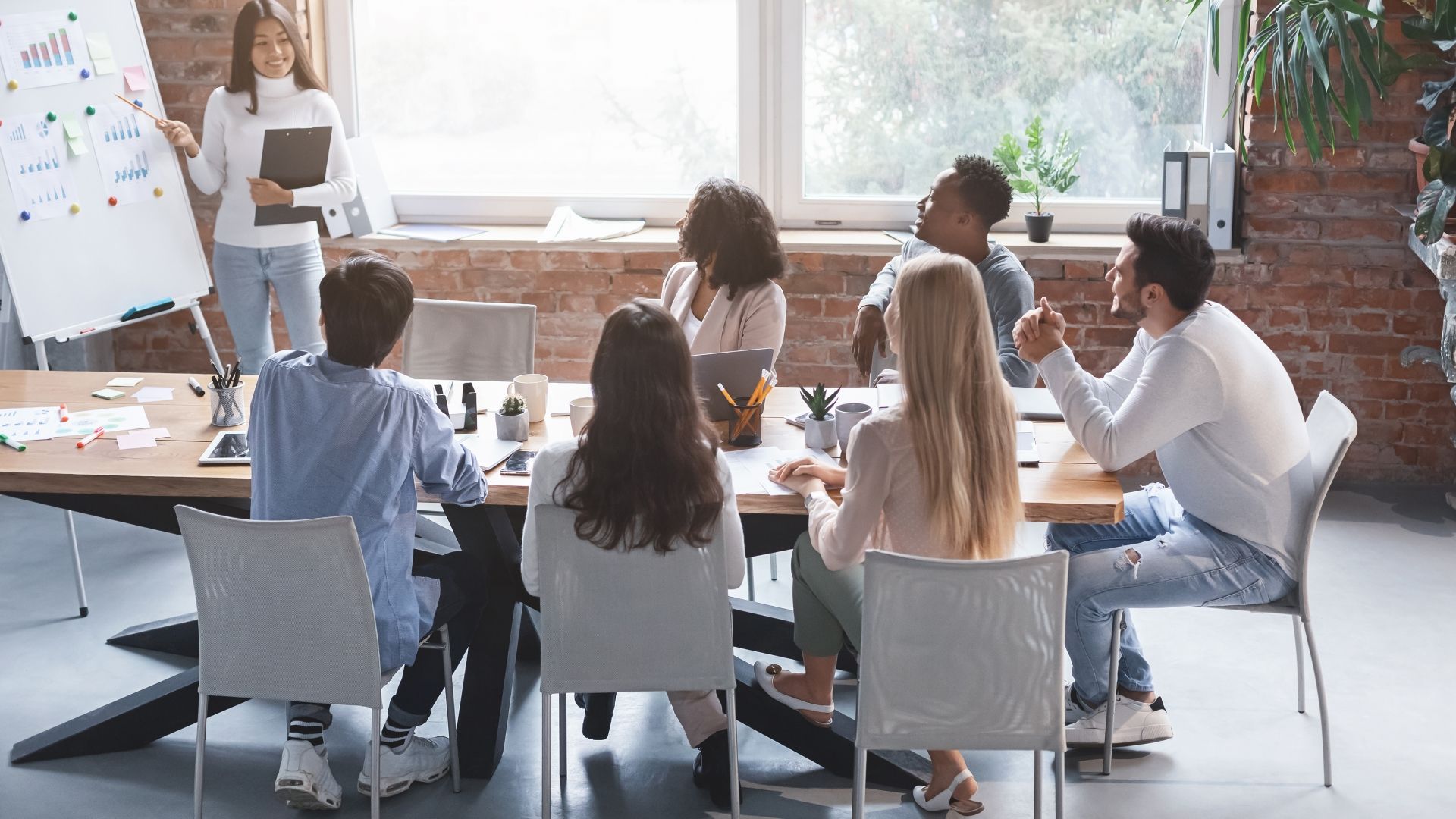 Students sat discussing business ideas