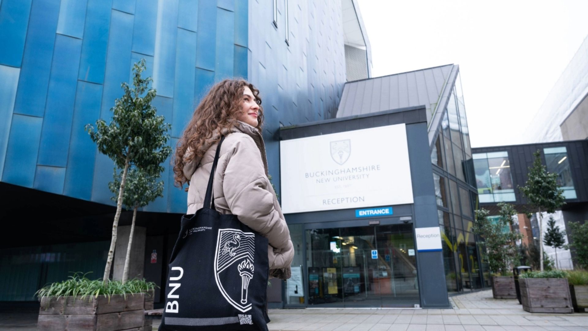 Student walking towards the university