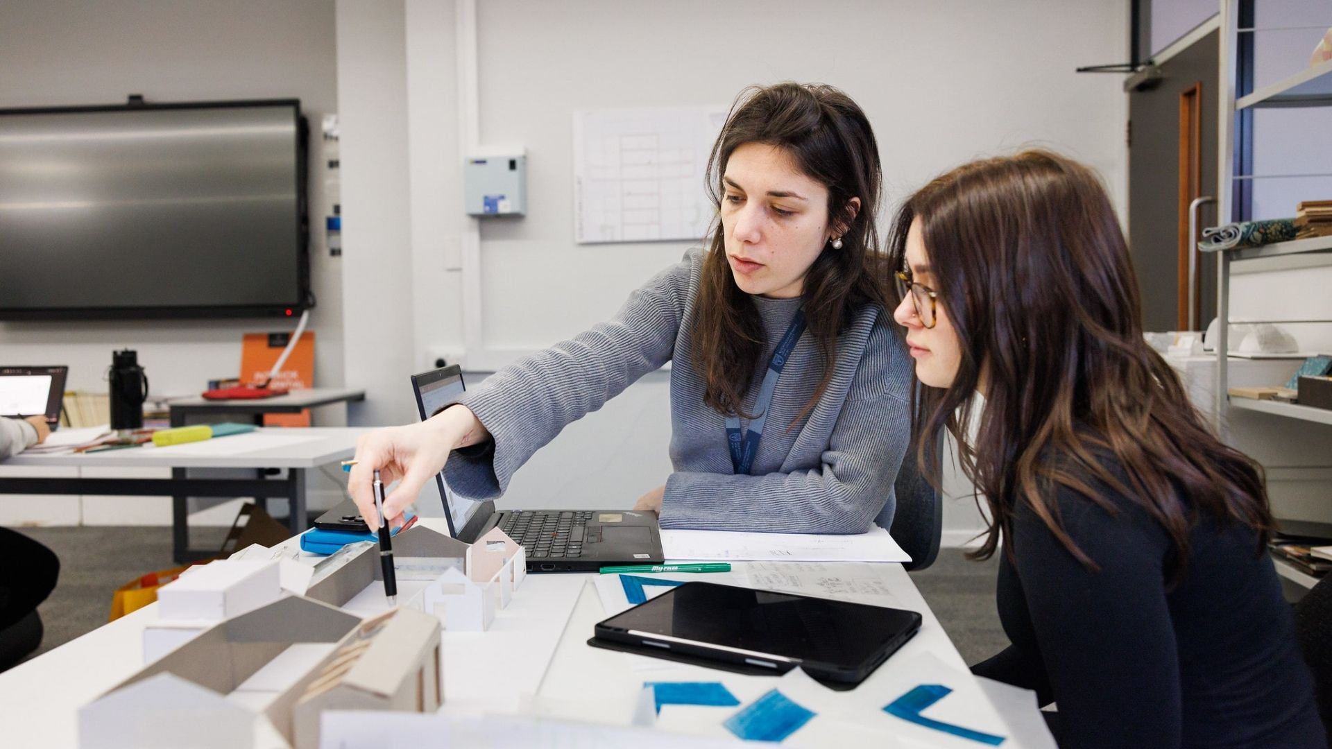 Interior and Spatial Design lecturer helping a student 2