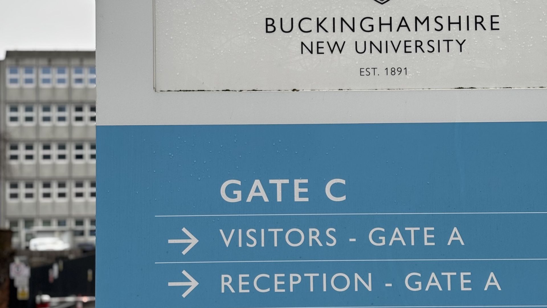 Car park sign stating GATE C