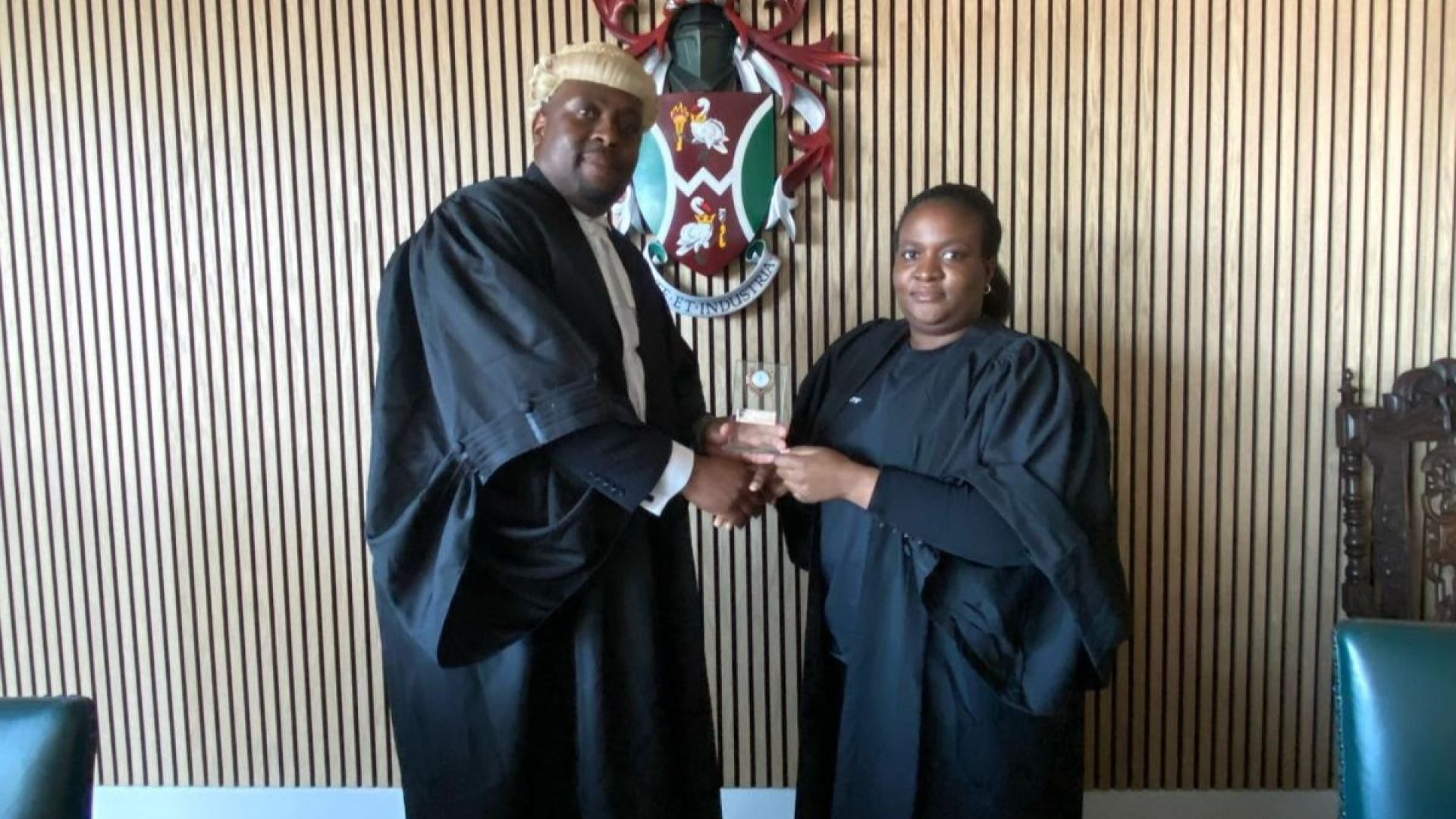 Joy Dellah-Gu with law lecturer