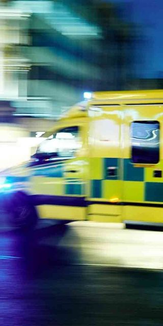 Blurry photo of an ambulance driving