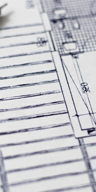 Close up of a floor plan drawing on a bit of paper