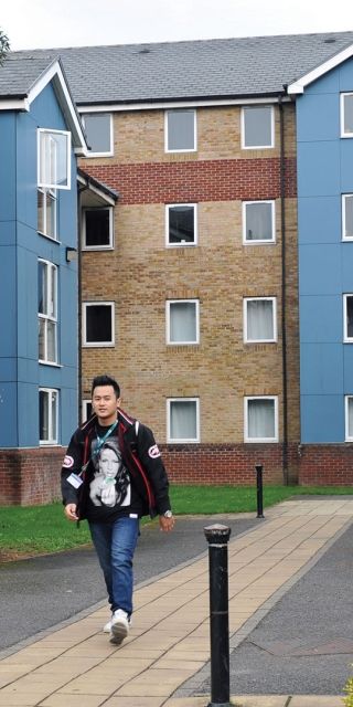 BNU student walking outside Brook Street accommodation