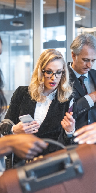 Group of people at airport security 