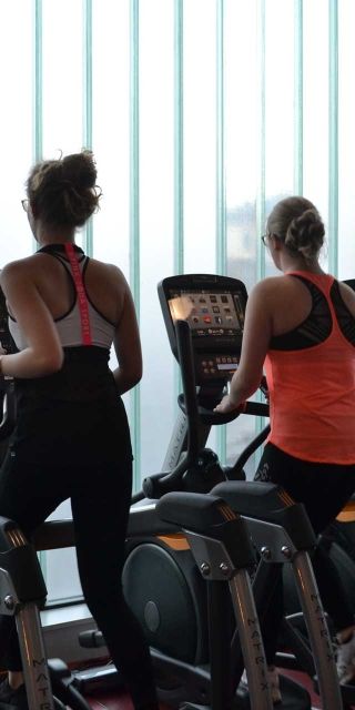 Two ladies on running machines