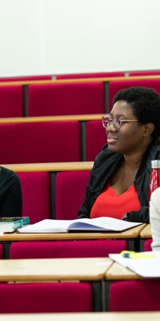 five students in lecture theatre
