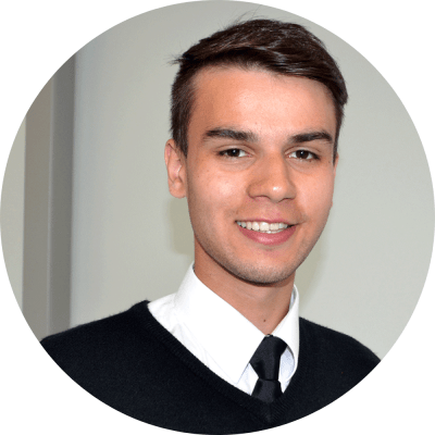 Head and shoulders image of Edgar, an aviation student smiling student quote