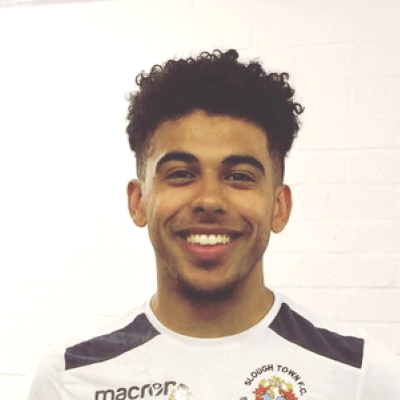 Headshot of a smiling Harrison Gilkes