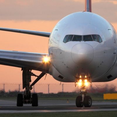 front view of an airplane on a runway