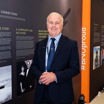 Stuart Green next to father's World War II story