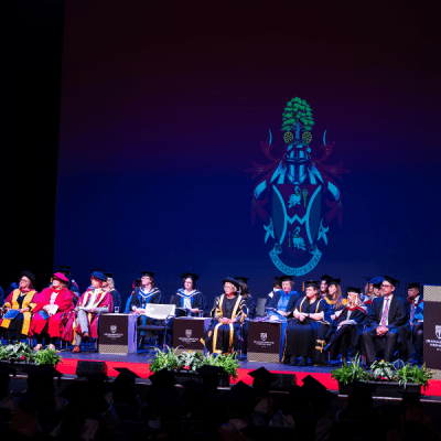 Graduation guests sat in the awards ceremony whilst the Vice-Chancellor gives a speech