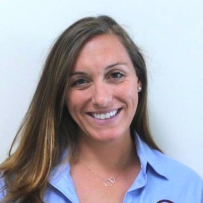 A headshot of a smiling Laura Richards, an academic at BNU, looking directly into the camera