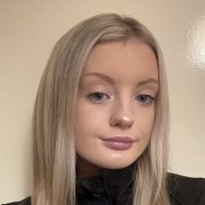 A headshot photo of Caitlin Barry, a BA Events Management graduate at BNU.