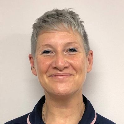 A headshot of Claire Melia, a Midwife teaching on the Midwifery course at BNU.