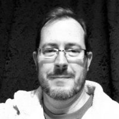 A headshot of BNU lecturer Joel Weaver.