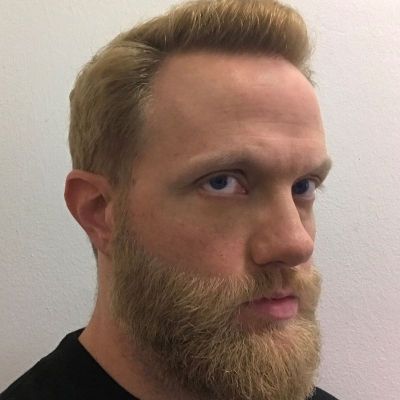 Headshot of Cole Robertson, a Art and Design lecturer.