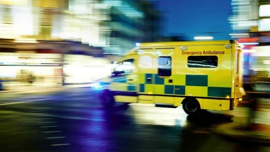Blurry photo of an ambulance driving