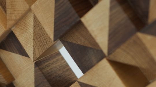 Triangular patterns in wood with varying height