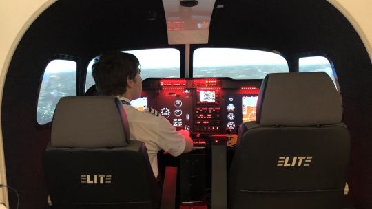aviation student in simulation