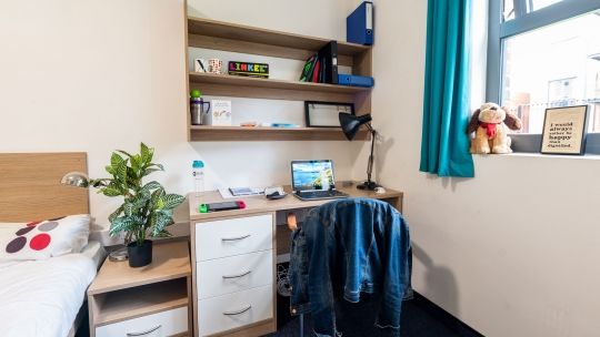 Desk in bedroom at Hughenden accommodation