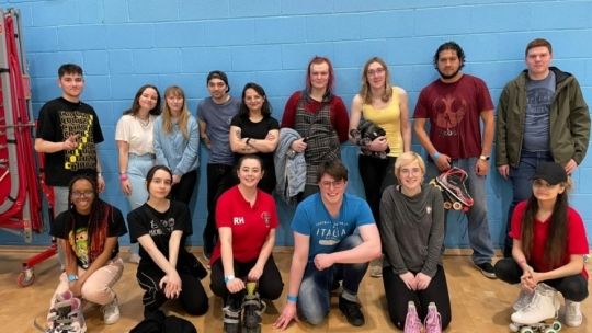 students gathered together for camera