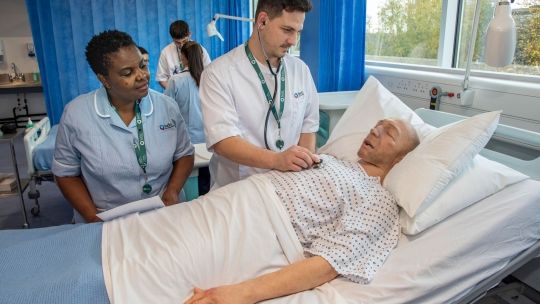 Aylesbury simulation suites nurses stood over simulation dummy