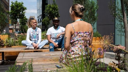 Students on gateway concourse in sunshine