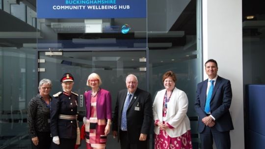 BNU staff and NHS staff standing outside Wellbeing Hub