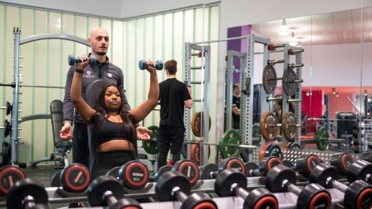Female student working out in Gateway Gym