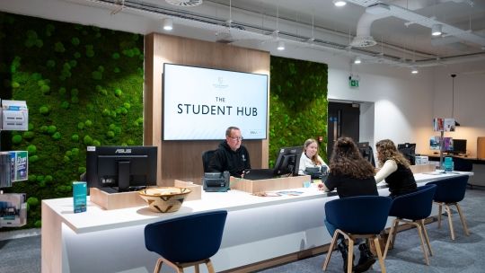 Students and staff in Student Hub