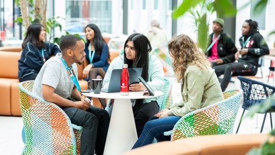 Group of students sat together in Winter Garden