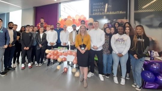 Business students presenting their work at the year-end showcase