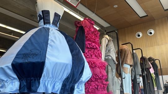 student-designed costumes in a row