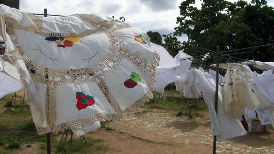 Items hanging on clothing rail outdoors