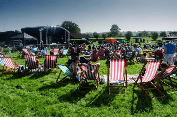 students in sunshine at Subwoofers Student Event