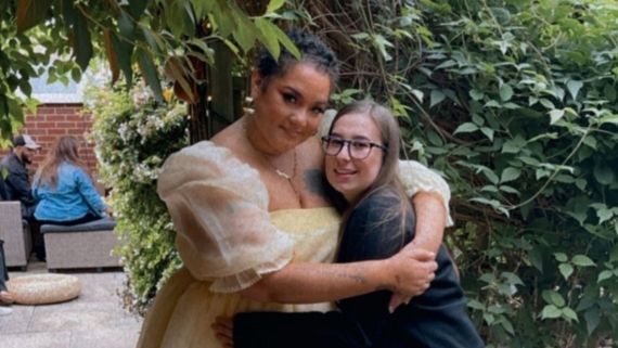 Grace and Alice embrace