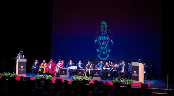 Graduation guests sat in the awards ceremony whilst the Vice-Chancellor gives a speech